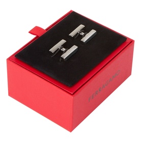 Salvatore Ferragamo silver cufflinks with rectangular bar design, presented in a red branded gift box with black velvet interior.