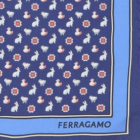 Salvatore Ferragamo blue silk pocket square with white rabbit and duck print, red floral motifs, and light blue border edge.