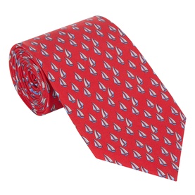 Salvatore Ferragamo red silk tie with an all-over sailboat print in white and navy, rolled to display full width and pattern detail.