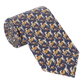 Salvatore Ferragamo Ioga Dog Silk Tie in navy, featuring an all-over dog print, rolled to show pattern detail. 100% silk.