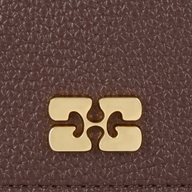 Ganni Chicory Coffee cardholder close-up showing gold-tone branded clasp detail on textured faux leather exterior.