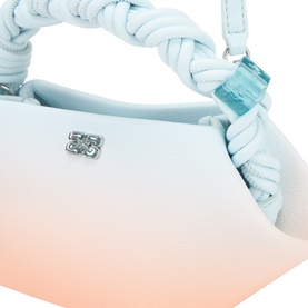 Ganni Bou Mini Crossbody Bag in Country Air, blue-to-peach gradient with braided top handle and silver-tone hardware detail