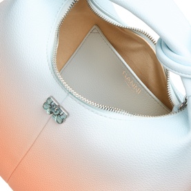 Ganni Hobo Mini Crossbody Bag in Country Air, open top zip revealing beige lining, silver-tone Butterfly hardware detail visible