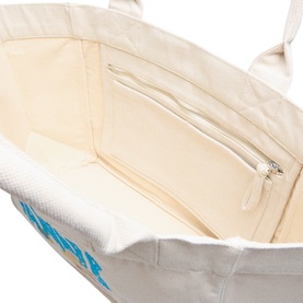 Ganni Strawberry Logo Medium Tote Bag in Sunlight, interior view showing zip pocket and canvas lining with silver hardware