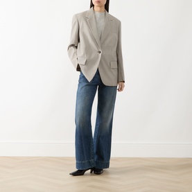 Model wearing Max Mara Weekend Attila Single-Breasted Oversized Blazer in hazelnut, styled with blue wide-leg jeans and black heeled boots