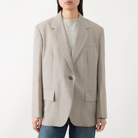 Model wearing Max Mara Weekend Attila Single-Breasted Oversized Blazer in hazelnut, styled with a grey top and blue jeans