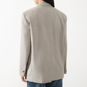Model wearing Max Mara Weekend Attila Single-Breasted Oversized Blazer in hazelnut, back view, styled with blue jeans.