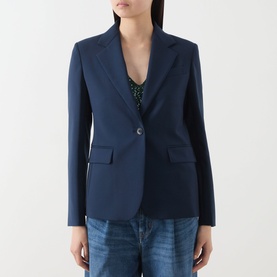 Model wearing Max Mara Weekend navy virgin wool blazer with single button fastening, styled with green top and blue jeans.