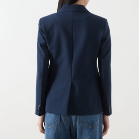 Model wearing Max Mara Weekend navy wool blazer, back view, styled with blue jeans