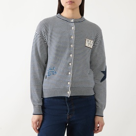 Model wearing Max Mara Weekend Teiera Stripe Cardigan in navy pinstripes with star and badge embellishments, styled with dark jeans.