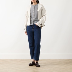 Model wearing Max Mara Weekend Teiera Stripe Cardigan in Navy Pinstripes, styled with dark blue jeans and black loafers.