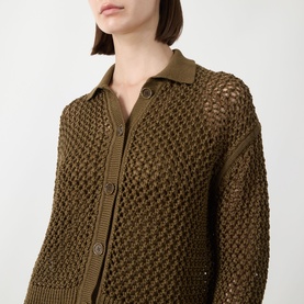 Model wearing Max Mara Main Film Open-Knit Cardigan in kaki, featuring polo collar, button front, and open-knit cotton construction