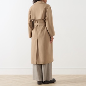 Model wearing Max Mara Weekend camel wool coat, back view, with tie belt, styled with grey wide-leg trousers