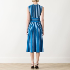 Model wearing Max Mara Main Agreste Stripe Dress in Ocean, sleeveless midi with fitted waistband and flared skirt, back view, styled with black heels