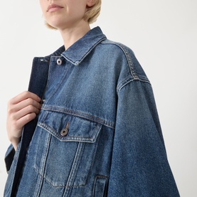 Model wearing Max Mara Weekend Liuti Denim Jacket in Navy Vintage, showing point collar, dropped shoulders, and buttoned chest flap pockets