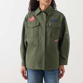 Model wearing Max Mara Weekend kaki cotton jacket with contrast embroidered patches, chest pockets, styled with blue jeans