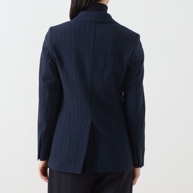 Model wearing Max Mara Main ultramarine pinstripe wool blazer jacket, rear view showing tailored fit and back vent
