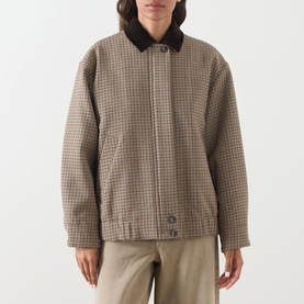 Model wearing Max Mara Weekend Festa Check Print Bomber Jacket in brown small check, with dark corduroy collar and concealed zip fastening.