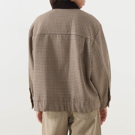 Model wearing Max Mara Weekend Festa Check Print Bomber Jacket in brown small check, back view, styled with beige trousers