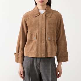 Model wearing Max Mara Weekend hazelnut suede goat leather jacket with snap buttons and patch pockets, styled with grey check trousers.