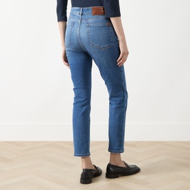 Model wearing Max Mara Weekend Lana Cropped Straight Leg Jeans in Navy Medium, rear view, styled with black loafers