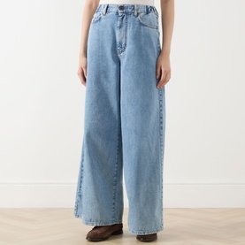 Model wearing Max Mara Weekend Zattera Wide Leg Jeans in blue, wide-cut silhouette, five-pocket style, part-elasticated waistband