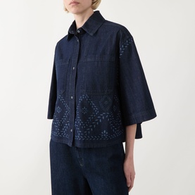 Model wearing Max Mara Weekend Alare Bandana Shirt in navy denim with bandana print, three-quarter sleeves, and chest pockets, styled with wide-leg