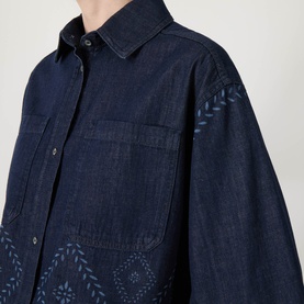Model wearing Max Mara Weekend Alare Bandana Shirt in navy denim with bandana embroidery detail, three-quarter sleeves and chest pocket visible