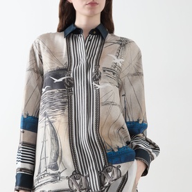 Model wearing Max Mara Main Teglia Printed Shirt in Stone Boats, silk with nautical boat print, contrast stripes and teal accents, classic collar