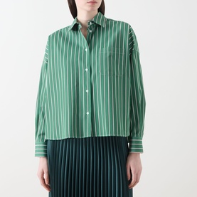 Model wearing Max Mara Weekend Onore Stripe Shirt in Green Big Stripe, cotton, with pointed collar and dropped shoulders, styled with dark pleated