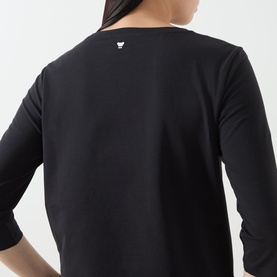 Model wearing Max Mara Weekend Multia Solid T-Shirt in black, back view showing logo detail at neck and three-quarter length sleeves.