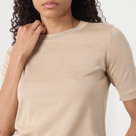 Model wearing Max Mara Weekend Tapioca Fine-Knit Sweater in sand, close-up showing crew neck and short sleeves in fine wool-silk-cashmere knit