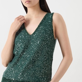 Model wearing Max Mara Weekend Milord Embellished Knitted Vest in green, V-neck sleeveless tank with all-over sequin detailing