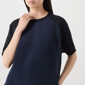 Model wearing Max Mara Main Golfo Two-Tone Knitted Sweater in Ultramarine with contrasting black short sleeves and chest patch pocket