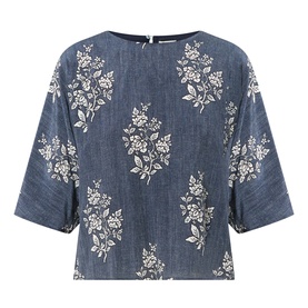 Navy blue floral print top with three-quarter sleeves, button back detail, and relaxed fit in lightweight chambray-style fabric