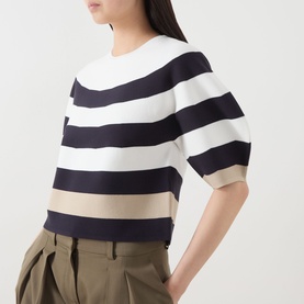 Model wearing Max Mara Main Voto Striped Sweater in ultramarine, white and beige bold stripes, cropped length, kimono sleeves, styled with khaki