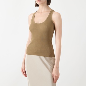 Model wearing Max Mara Main kaki ribbed viscose sleeveless vest top with scoop neck, styled with a cream midi skirt.