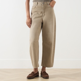 Model wearing Max Mara Weekend Arcadia Barrel-Leg Jeans in beige light, high-rise barrel-leg cut, styled with brown loafers