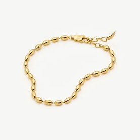 Missoma gold oval beaded chain bracelet with lobster clasp and extender chain, no model.