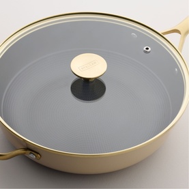 Stellar Cast Light Saut&eacute; Pan 28cm in Clay with gold-tone handles, glass lid with gold knob, and grey non-stick interior.