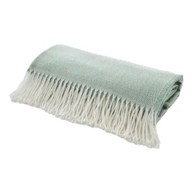 The Lyndon Company Arcadia Throw in sage green with cream fringe trim, folded to show woven texture.