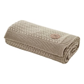 The Lyndon Company Cadenza Throw Natural, folded, featuring cable-knit texture with ribbed edges and embroidered floral motif