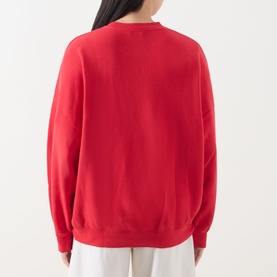 Model wearing AMERICAN VINTAGE red cotton sweat top, rear view showing relaxed crew neck silhouette and dropped shoulders
