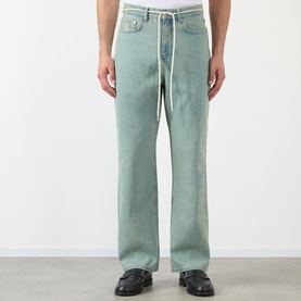Model wearing About:Blank jeans in murky wash, straight-leg fit with drawstring waistband detail, paired with black loafers.