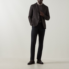 Model wearing Boglioli brown wool-blend jacket, styled with dark trousers, knit vest, white shirt, and black loafers.