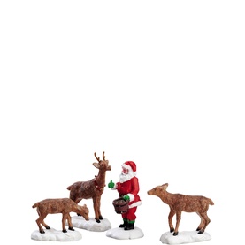 Santa Feeds Reindeer Figurines Set of Four