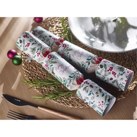 Robin Reed white Christmas crackers with botanical berry and holly print, styled on wicker placemat with cutlery and baubles