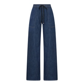 Seven Jeans Wide Leg jeans in Halona blue denim, featuring a drawstring waistband, wide-leg silhouette and front patch pockets.