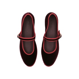 Flabelus red velvet Mary Jane flats with contrast piped trim, buckle strap detail, flat sole, top-down view