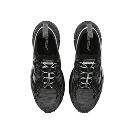 Off-White black chunky trainers with mixed mesh and glossy panels, white lace detail and dark rubber sole, top-down view